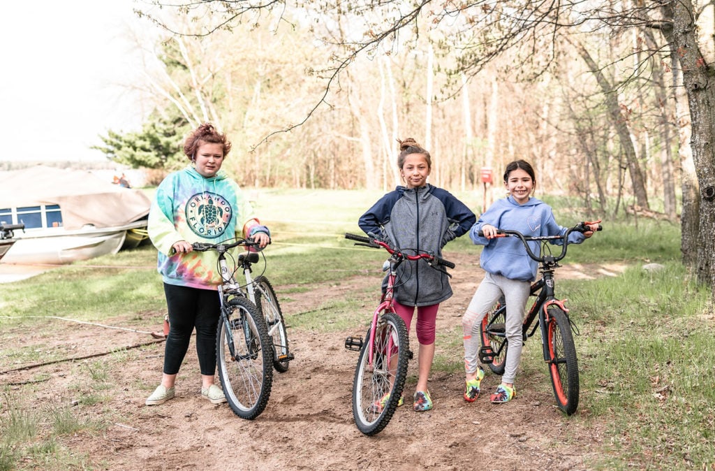 Three kids with bikes