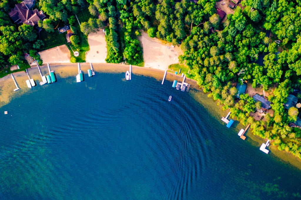 Aerial shot of a lake and woods