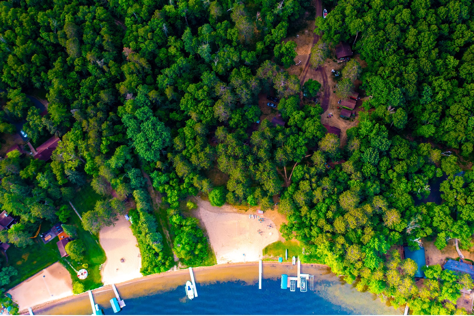 Aerial shot of a lake with woods