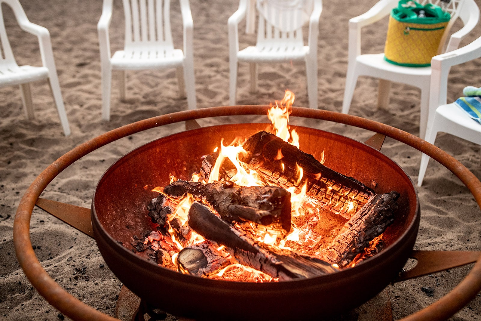 Fire pit on the beach at Boyd Lodge
